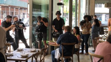 Travel Channel, Man v. NYC, Behind the Scenes, Casey Webb from man vs food and Vivian Chan from food network battle it out to see who knows NYC best. Branded content.Production services, original content, filming and editing, CaveLight Films. Restaurant with outdoor seating. Filming for travel channel.